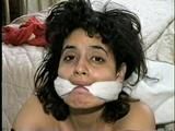 18 Yr OLD LATINA ZARR IS GAGGED WITH SWEATY STINKY NYLONS, TIED WITH LEATHER BELTS, CLEAVE GAGGED, BAREFOOT, BALL-TIED & HANDGAGGED (D54-8)