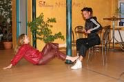 Leonie and Stella during their workout in a fitness studio wearing sexy shiny nylon rainwear (Pics)