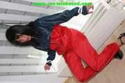 Get 687 Pictures with Stella tied and gagged in shiny nylon rainwear from 2005-2008!