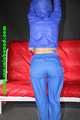 Sexy Sonja being tied and gagged overhead with ropes wearing a sexy blue shiny nylon pants and a jacket (Pics)