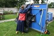 Watch Sandra in the Garden wearing a Rainskirt and Rainjacket