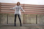 Miss Petra in transparent Hunter rain jacket and patent leggings