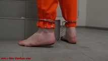 Female prisoner cuffed and shackled