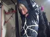 Watch Sonja enjoying Bondage in her shiny nylon Rainwear