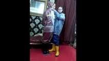 Lady Nadja and Miss Scarlett in  AGU rainwear covered with transparent raingear (video)