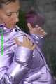 Watch Sandra taking a shower in her new purple shiny nylon down jacket 