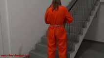 Female prisoner cuffed and shackled