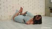 Natasha - Barefoot BBW girl hogtied 