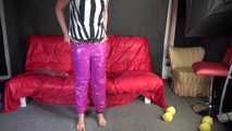 Watching sexy Pia putting on a purple shiny nylon pants of CRAZYSEBSATION and a white/black striped top (Video) 