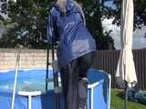 Watch Chloe cleaning the Pool in her shiny nylon Rainwear