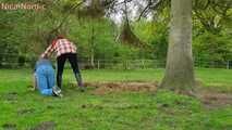 Rubber boot mistress presses slave face into manure