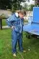 Watch Sandra playing table tennis in her shiny nylon Rainwear