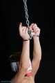 Naked, helpless and handcuffed
