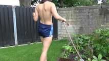 Watching Ayiana wearing  only a sexy blue shiny nylon shorts watering the flowers (Video)