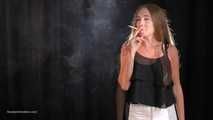 Elena is showing her smoking skill in this clip