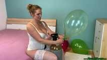 helium overinflating six balloons in white lingerie