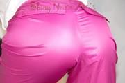 Lulu wearing a supersexy pink rainwear combination during her workout playing with the camera (Pics)