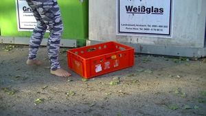 barefoot at the garbage