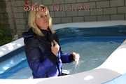 Sexy PIA wearing a shiny nylon rain pants and a down jacket taking a bath in the pool and take a sunbath (Pics)