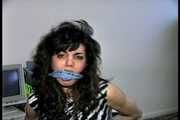 35 YEAR OLD ITALIAN HAIRDRESSER IS CLEAVE GAGGED, MOUTH STUFFED WITH PANTIES, HANDGAGGED, WHILE TIGHTLY TIED TO A CHAIR (D74-14)