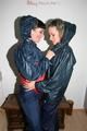 Jill and Petra touching eachother while wearing shiny nylon rainwear (Pics)