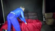 Sexy Sonja changing clothes wearing a sexy blue rainwear combination and preparing her sofa (Video)