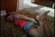34 YEAR OLD HOTEL MANAGER IS HOG-TIED, CLEAVE GAGGED, UPSKIRT, BAREFOOT, TOE-TIED, HANDGAGGED AND ROPE TIED ON THE SOFA (D73-10)