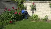watch Sonja taking care of the garden enjoying her shiny nylon rainpants and her nylon windbreaker!