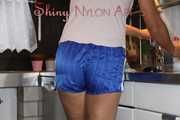 Watching sexy Pia wearing a sexy blue shiny nylon shorts and a tshirt doing her housework (Pics)