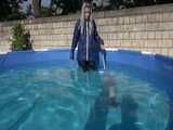 Watch Chloe cleaning the Pool in her shiny nylon Rainwear