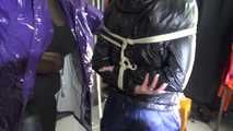 Watching sexy Sonja being tied and gagged overhead with ropes and a clothgag from a female rigger both wearing sexy shiny nylon rainwear (Video)