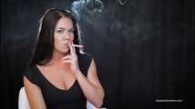 Delicious lady Tanya is engrossed in smoking a 120mm cigarette