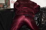 Watching Lucy wearing a supersexy purple/red downsuit preparing her sofa and lolling on it (Pics)