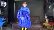 Watching sexy Pia wearing putting on several layers of sexy shiny nylon rainwear (Video)