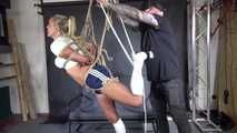 Ms Ungeniert bound, suspendet and whipped at the end, in shiny nylon Shorts 2/2