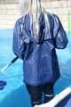 Watch Chloe cleaning the Pool in her shiny nylon Rainwear