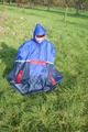 Jill wearing supersexy shiny nylon rainwear and a rain cape posing outdoor in the field (Pics)