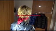 Sonja tied and gagged on a chair wearing a sexy red shorts and an oldschool rain jacket (Video)