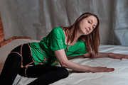 Shibari jute karada in green shirt and black leggings