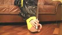 [From archive] Stella - taped sitting with yellow duct tape and packed into trash bag (video)