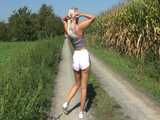 Watch Chloe taking a walk with her shiny nylon Shorts