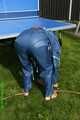 Watch Sandra playing table tennis in her shiny nylon Rainwear