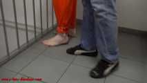 Female prisoner cuffed and shackled