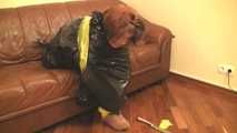 [From archive] Stella - taped sitting with yellow duct tape and packed into trash bag (video)