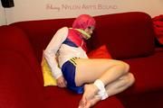 A nice cuty tied and gagged in shiny nylon shorts