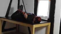 Aurora hogtied on table 2/2