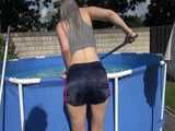 Watch Chloe enjoying her shiny nylon Shorts outside at a sunny Day