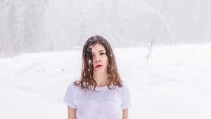 Vika tied up in the snow - Photos