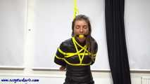 Tied and gagged leather lady