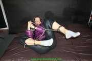 Watch Pia in her shiny nylon Downjacket doing Selfbondage with Handcuffs